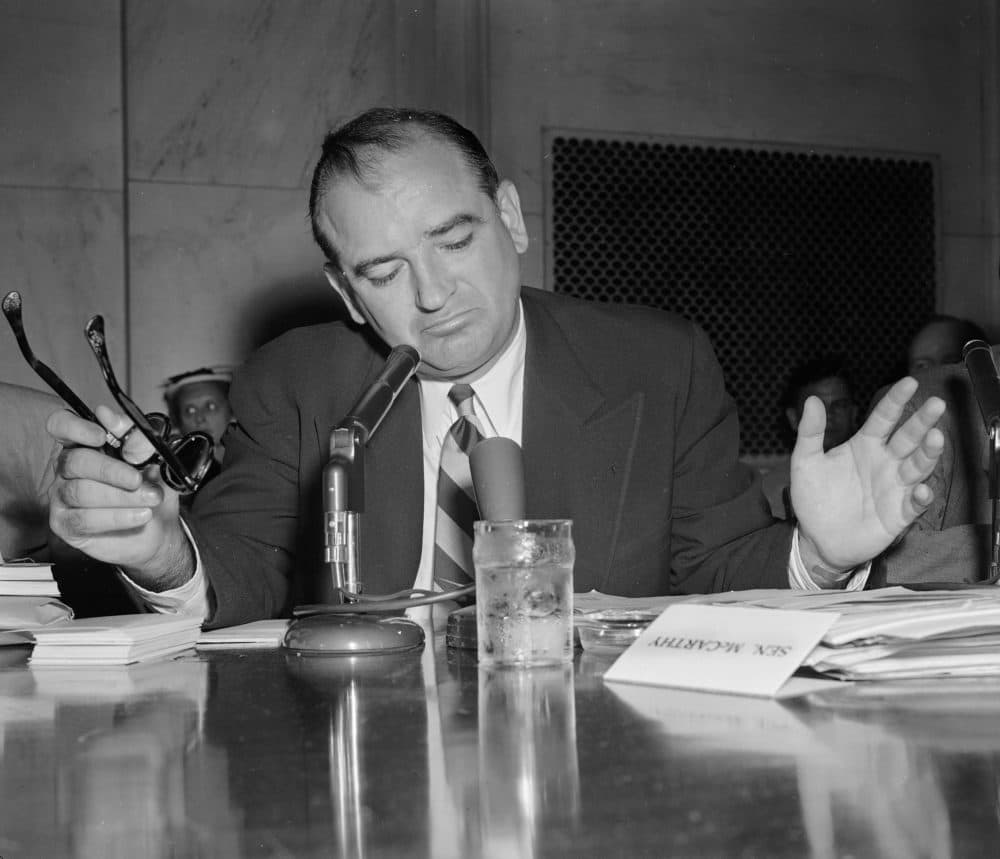 Sen. Joe McCarthy gestures as he indicates he is not impressed with an answer by Army Secretary Robert Stevens during a hearing, May 3, 1954. (AP Photo)
