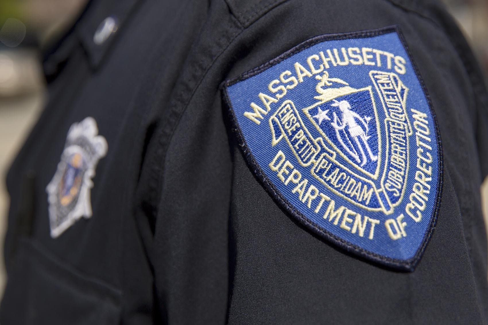Massachusetts Department of Correction badge. (Robin Lubbock/WBUR)