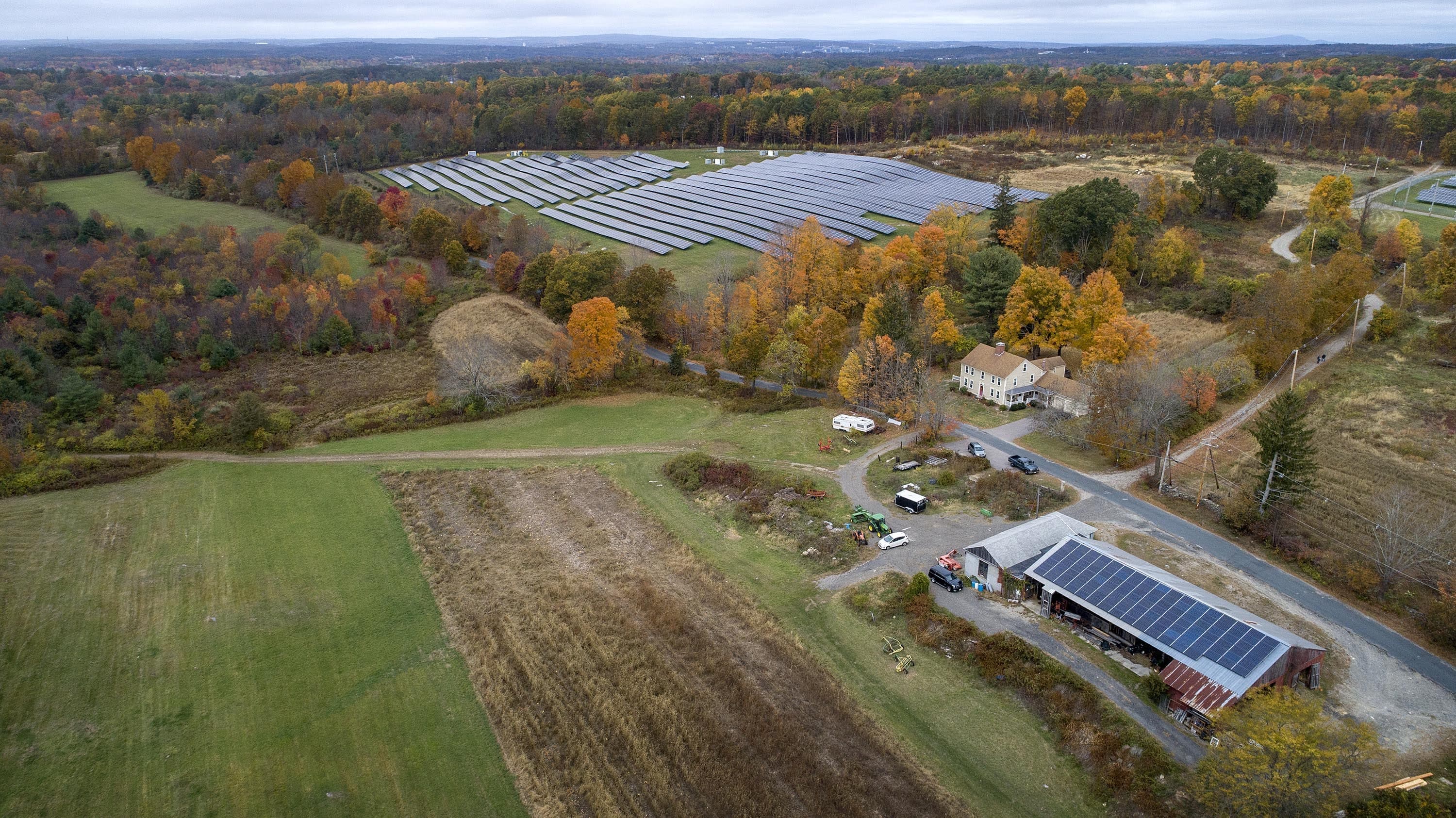 Farming the sun, Knowlton Farm in Grafton has solar panels on its barn roof, and in fields nearby. (Robin Lubbock/WBUR)