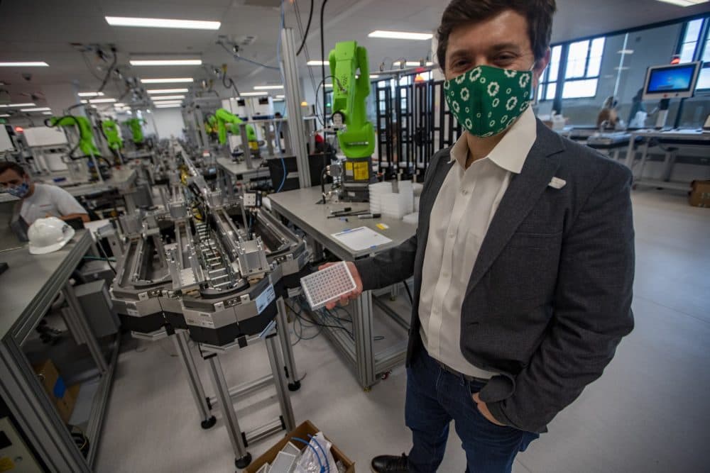 Jason Kelly, cofounder and CEO of Ginkgo Bioworks, holds a plate of the type that will be used for DNA analysis for coronavirus tests. (Jesse Costa/WBUR)