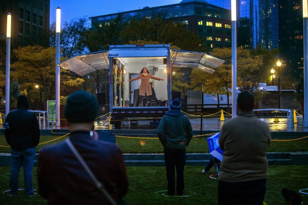Zaray Rodriguez performs from the BLO's Street Stage as the audience stands 25 feet away. (Jesse Costa/WBUR)