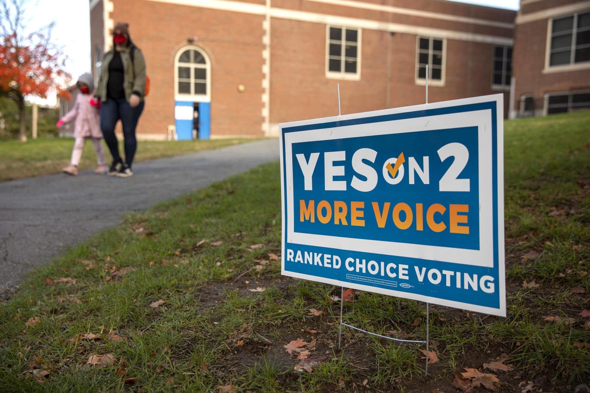 A &quot;Yes on 2&quot; sign outside East Boston High School voting station. (Robin Lubbock/WBUR)