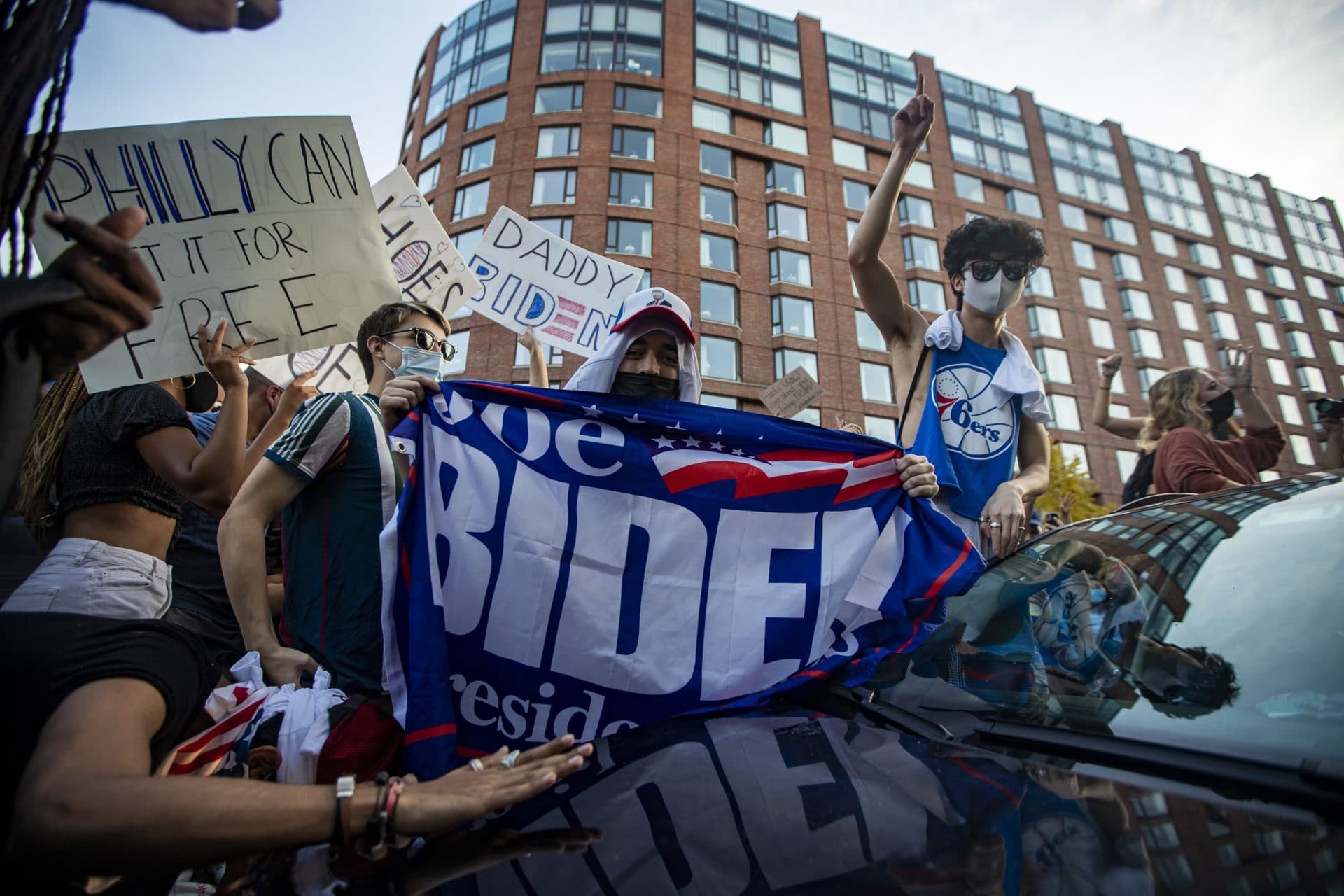 Hundreds of people gathered on Boylston Street preventing any vehicle traffic to celebrate Joe Biden’s presidential victory. (Jesse Costa/WBUR)