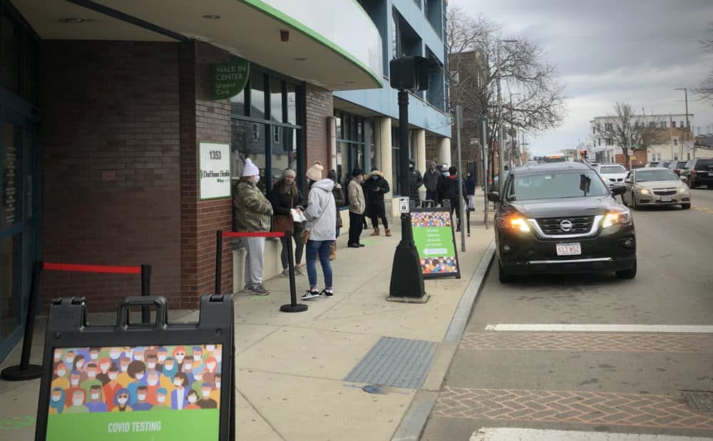 The start of the long line at DotHouse Health on Wednesday afternoon for coronavirus tests. (Carey Goldberg/WBUR)