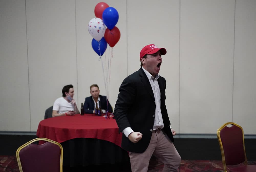 Donald Trump supporter John McGuinness celebrates while watching election returns in favor for Trump at a Republican election night watch party, Tuesday, Nov. 3, 2020, in Las Vegas. (John Locher/AP)
