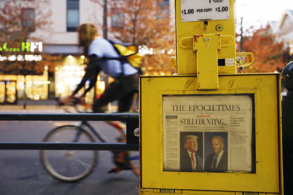 A newspaper from Thursday, Nov. 5 sits in a street box outside the Pennsylvania Convention Center in Philadelphia, where a handful of supporters of President Donald Trump continue to protest Monday, Nov. 9, 2020, two days after the election was called for Democrat Joe Biden. (Rebecca Blackwell/AP)