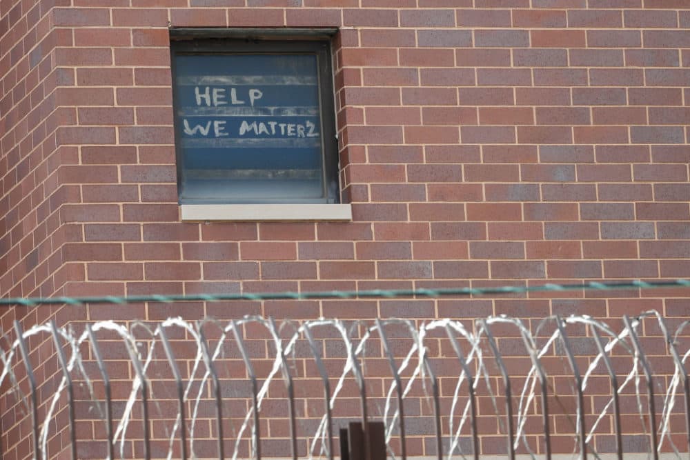 The words &quot;help we matter 2&quot; are seen written in a window at the Cook County Department of Corrections (CCDOC), housing one of the nation's largest jails, in Chicago, Illinois, on April 9, 2020. (Photo by Kamil Krzaczynski/AFP via Getty Images)
