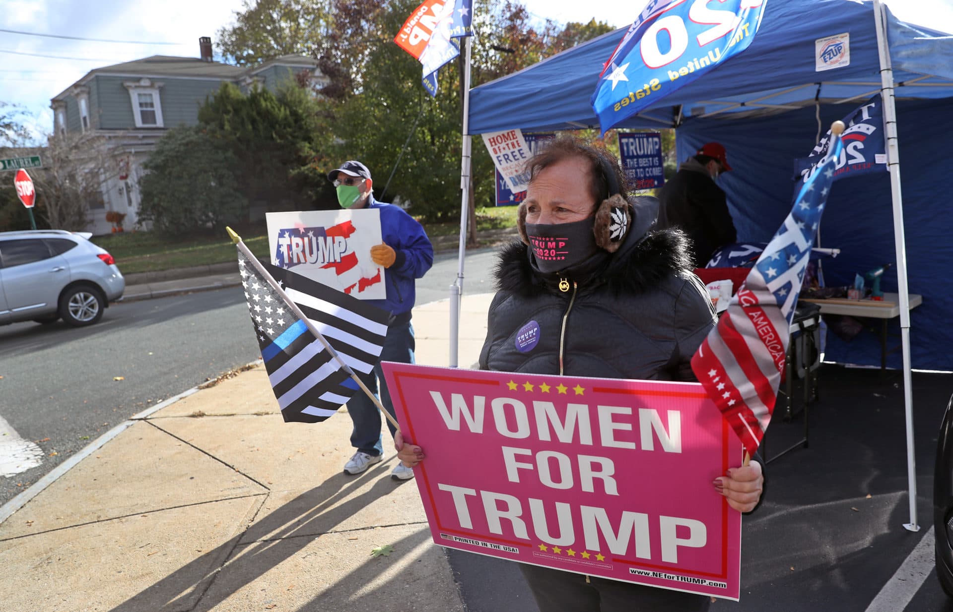 A woman holds a &quot;women for Trump&quot; sign at Whitman Town Hall. (David L. Ryan/The Boston Globe via Getty Images)