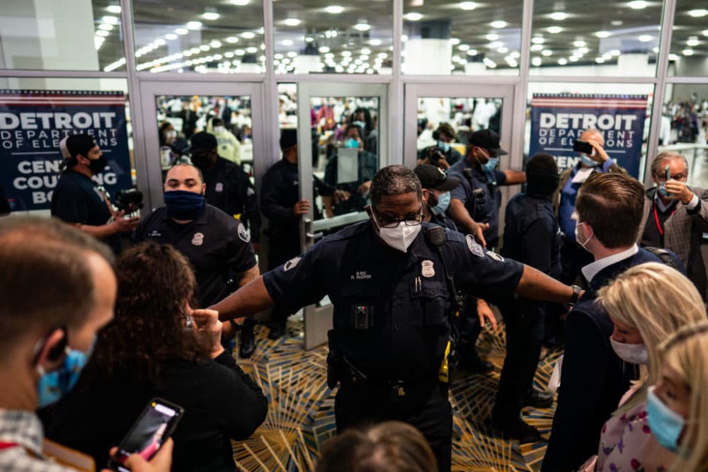 Election challengers demand to enter to observe the absentee ballots counting but were denied after the room reached capacity during the 2020 general election in Detroit, Michigan on Wednesday, Nov. 4, 2020. (Salwan Georges/The Washington Post via Getty Images)