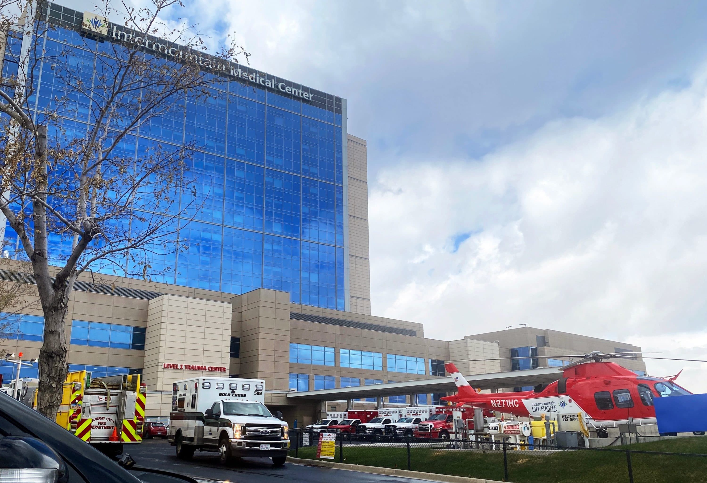 Ambulances line up at the entrance of the emergency room to drop off patients at Intermountain Medical Center in Murray, Utah, on Nov.11, 2020. Hospitals in the western state of Utah are preparing to ration care as COVID-19 patients flood their Intensive Care Units, according to local media. Utah Governor Gary Herbert, on Nov. 9, declared a state of emergency with a new mask mandate and other restrictions as Covid-19 cases surged and hospitals approach their capacity with record number of admissions. (STRINGER/AFP via Getty Images)