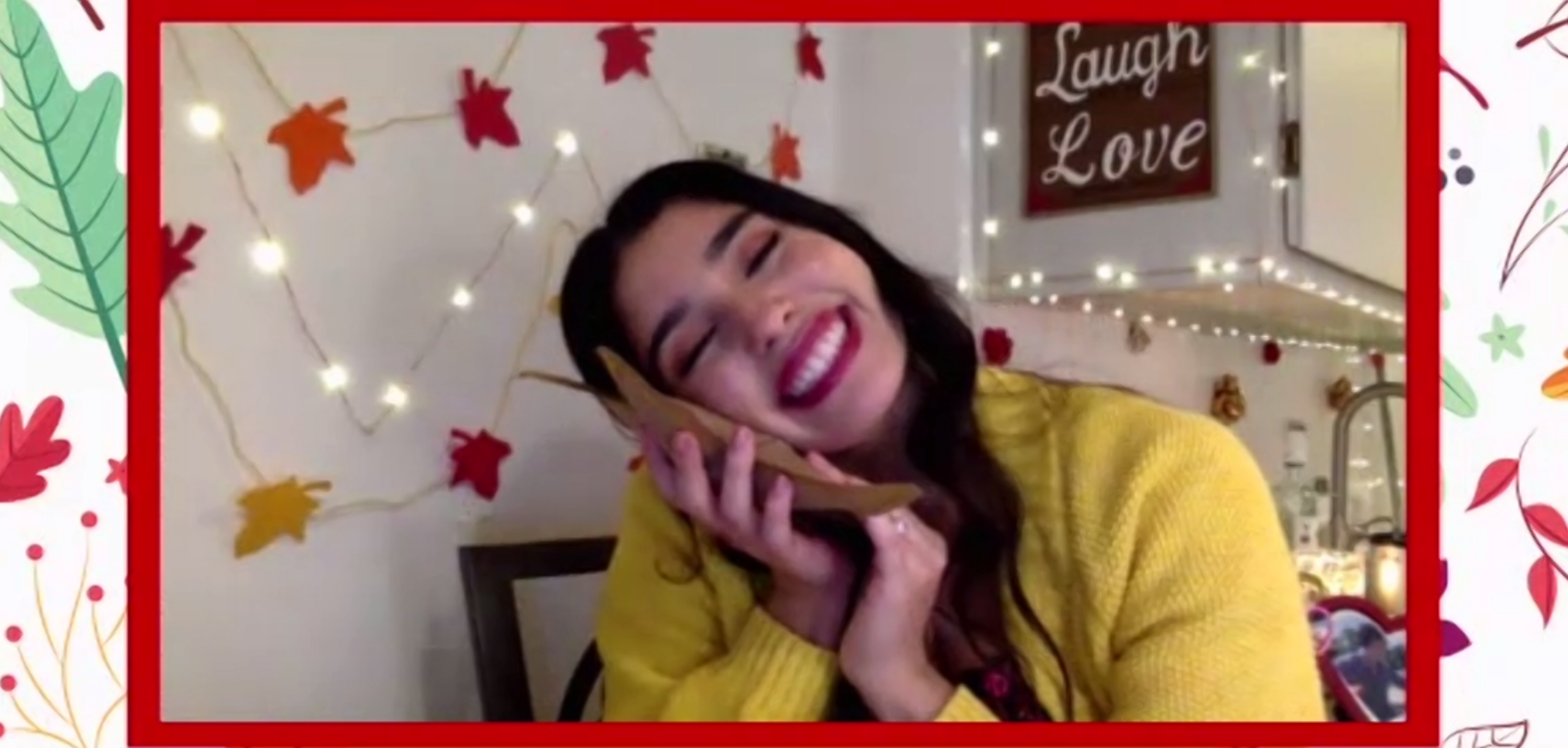 Amanda Figueroa lights up “A Very Herrera Holiday," part of New Repertory Theatre's "Showstopper Virtual Play Series." (Courtesy New Repertory Theatre)