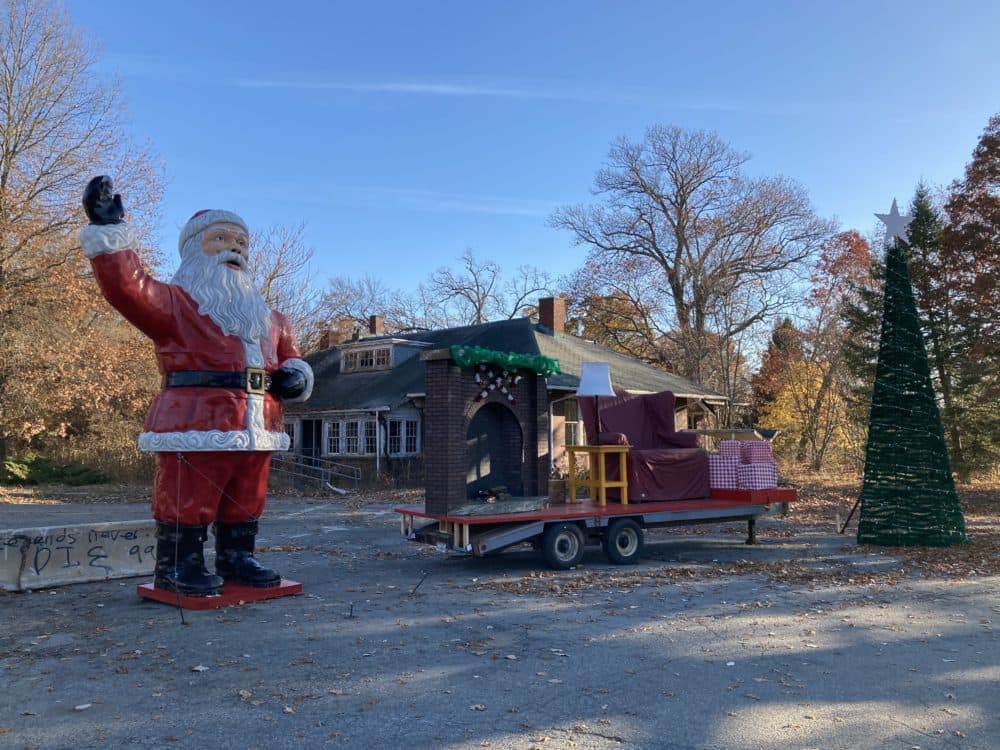 A Santa display for a Lions Club fundraiser at the former Walter E. Fernald Developmental Center. The basement of the building in the background was used for medical experiments on the bodies of deceased disabled inmates. (Courtesy)