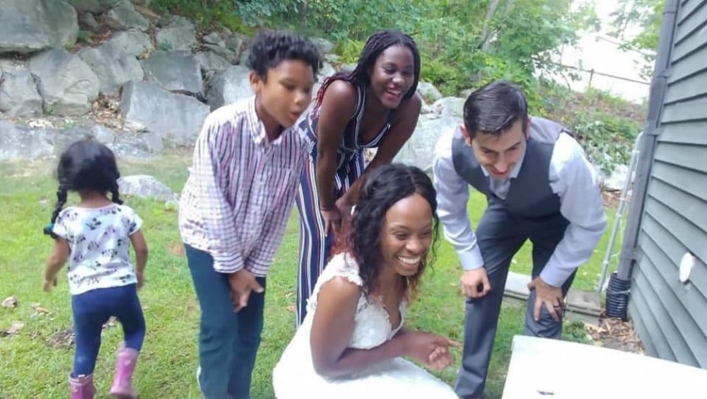 Judith Young says she and her family know their way around the virtual gathering scene. Here she is in August 2020 at her backyard vow renewal with her husband and kids. Guests attended via Zoom. (Courtesy)