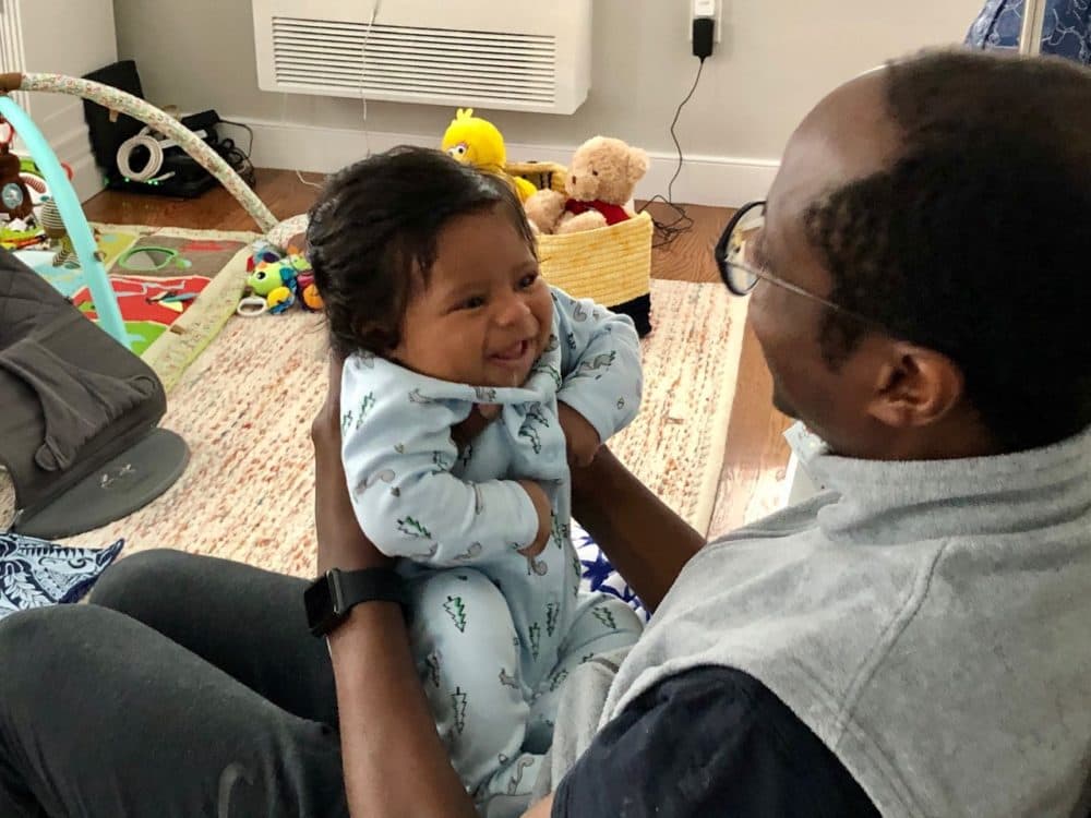 Tafadzwa Muguwe is pictured with his newborn son, Ronan, in the fall of 2020. (Courtesy)