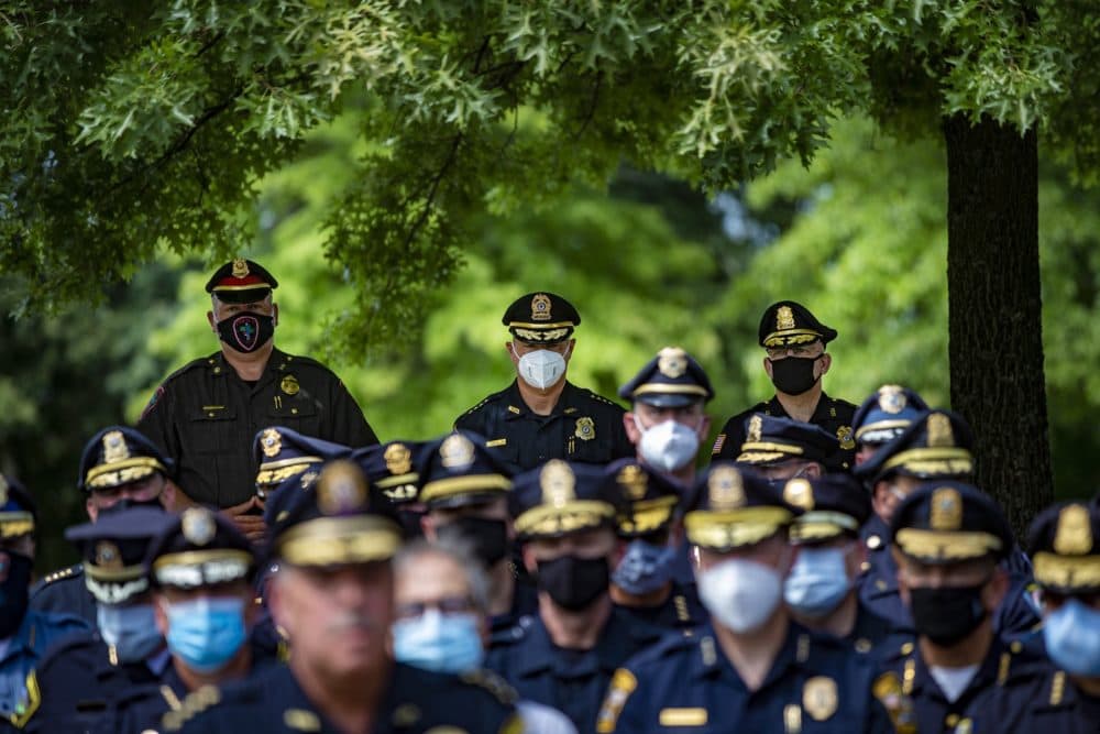 Police chiefs from across the commonwealth gathered in Framingham this summer to protest the early versions of the police reform bill. (Jesse Costa/WBUR)