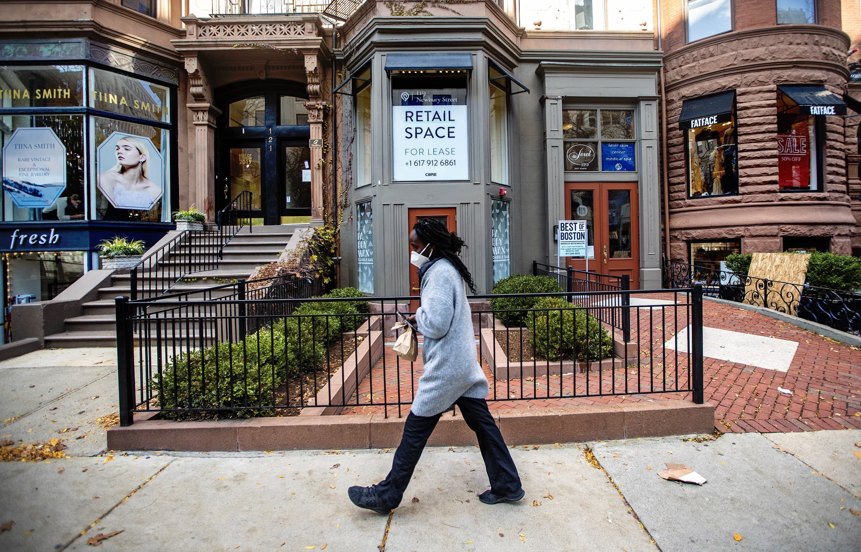 Signs advertising available retail space have become a more common sight along Boston's Newbury Street since the pandemic began. (Jesse Costa/WBUR)