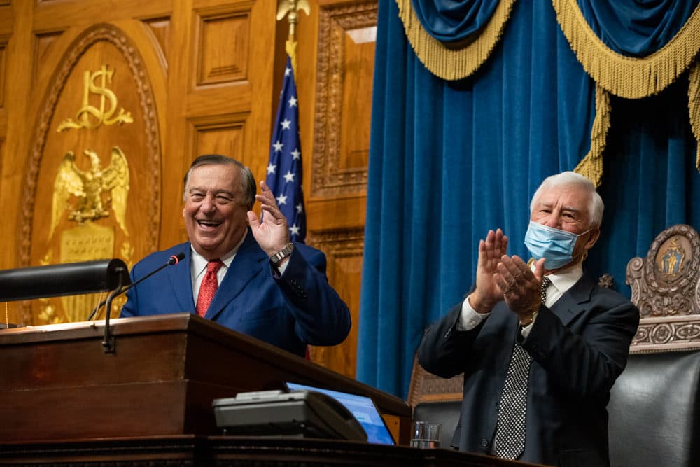 Retiring Rep. Angelo Scaccia (right), the dean of the House, presided over Mariano's election Wednesday and applauded after introducing the new speaker. (Sam Doran/SHNS)
