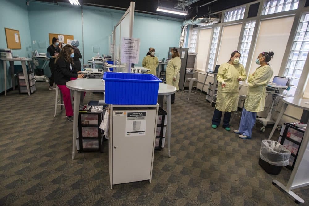 Medical technicians at the Tufts Medical COVID-19 Testing Center prepare for the day's testing. (Jesse Costa/WBUR)