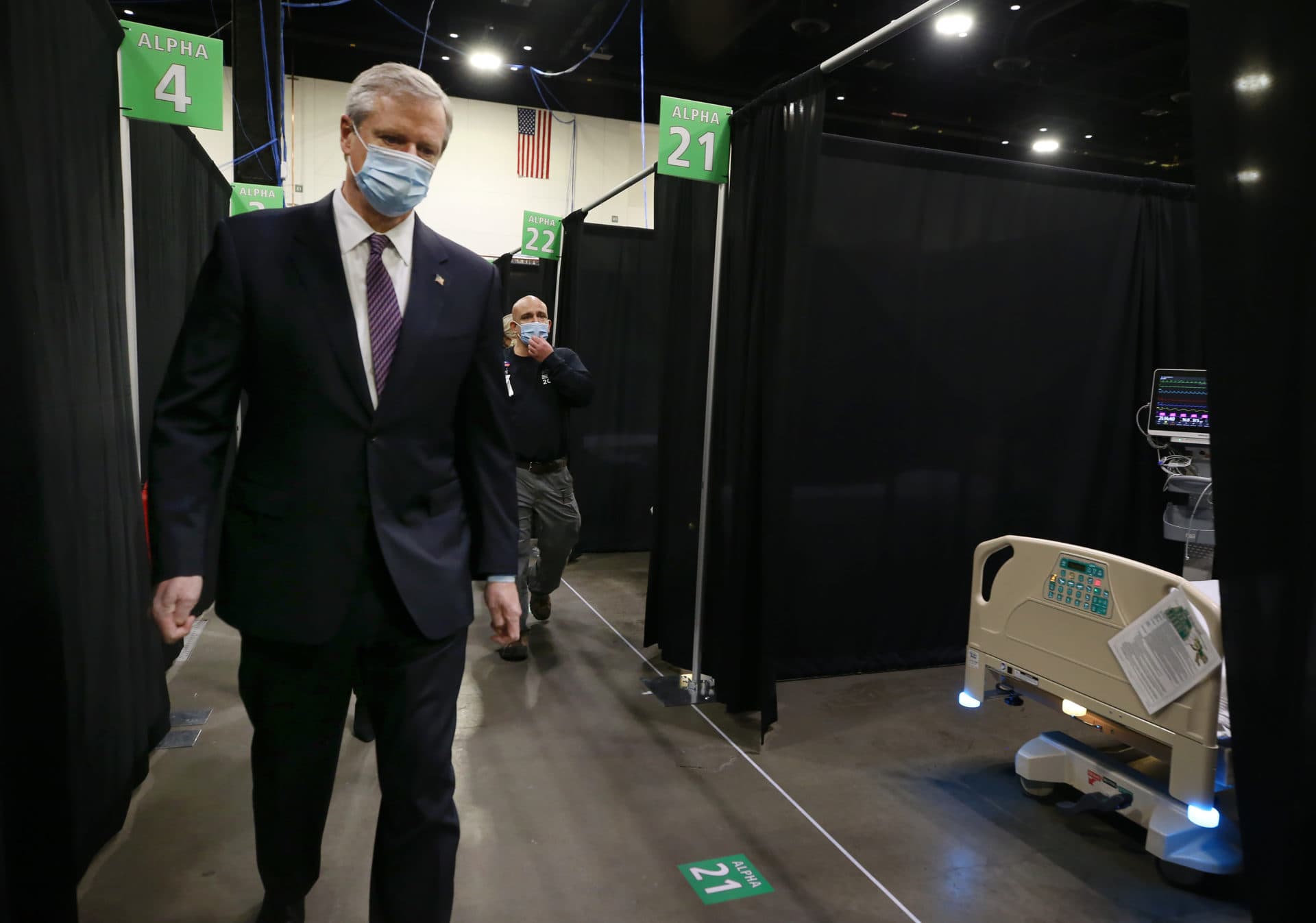 Gov. Charlie Baker tours the DCU Center as it gears up to be used as a Covid field hospital for the second time. (Nancy Lane/MediaNews Group/Boston Herald)