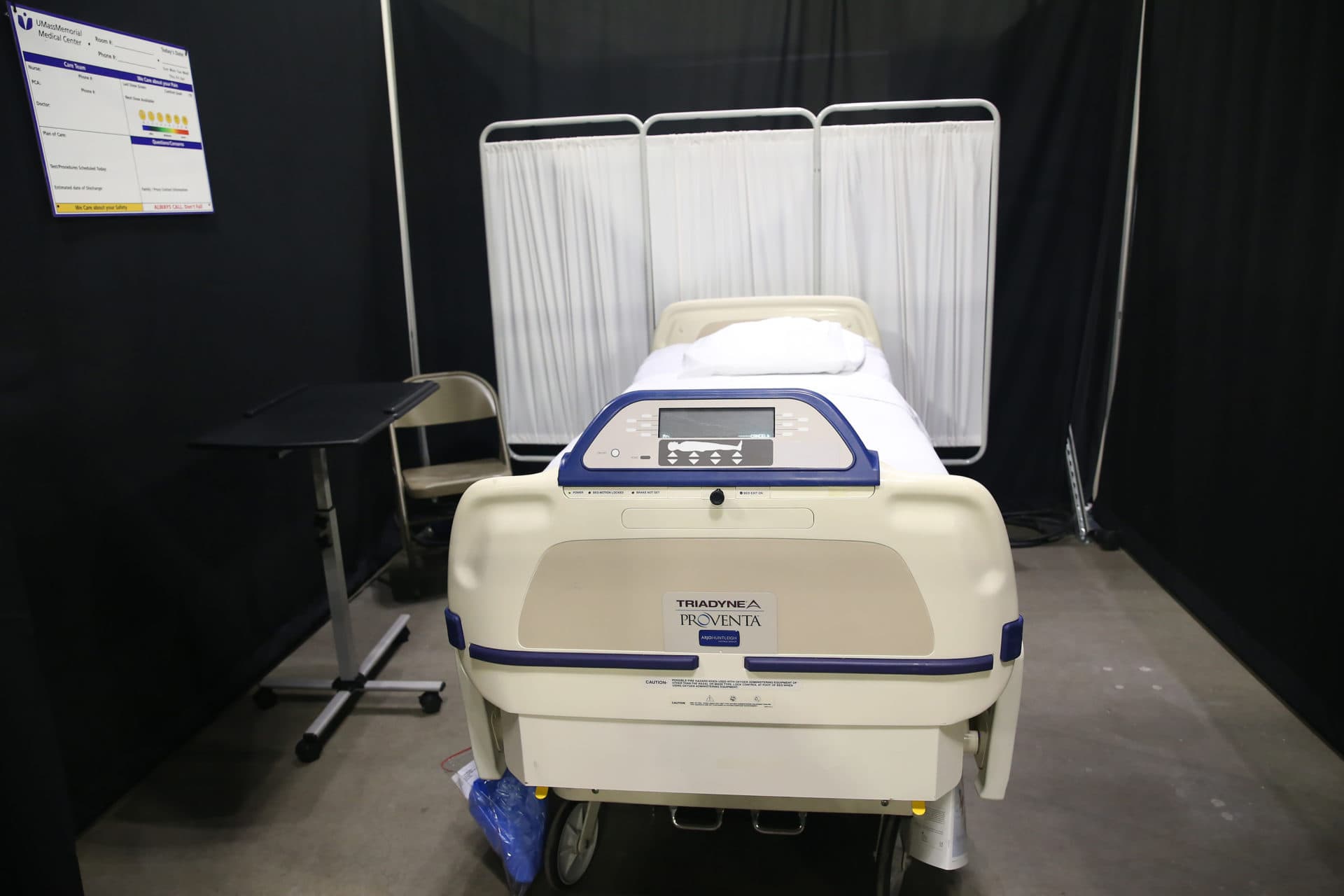 An inpatient room sits at the ready at the DCU Center as it gears up to be used as a Covid field hospital for the second time. (Nancy Lane/MediaNews Group/Boston Herald)