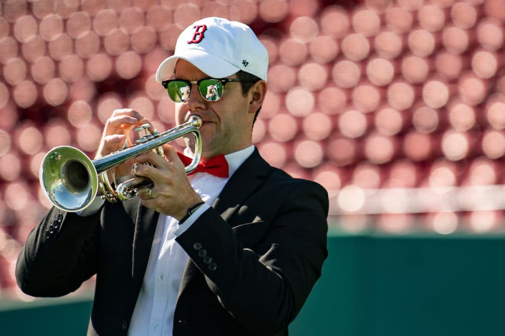 Members for the orchestra wore sunglasses in the bright sun. (Courtesy Billie Weiss/Boston Red Sox)
