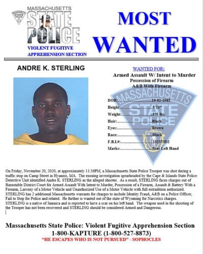 This poster, from the Massachusetts State Police Twitter page, posted Nov. 24, 2020, shows Andre K. Sterling. Sterling, a suspect in the shooting of a state trooper in Massachusetts, was killed during a shootout with U.S. marshals in the Bronx borough of New York early Friday, Dec. 4, 2020. (Massachusetts State Police via AP)