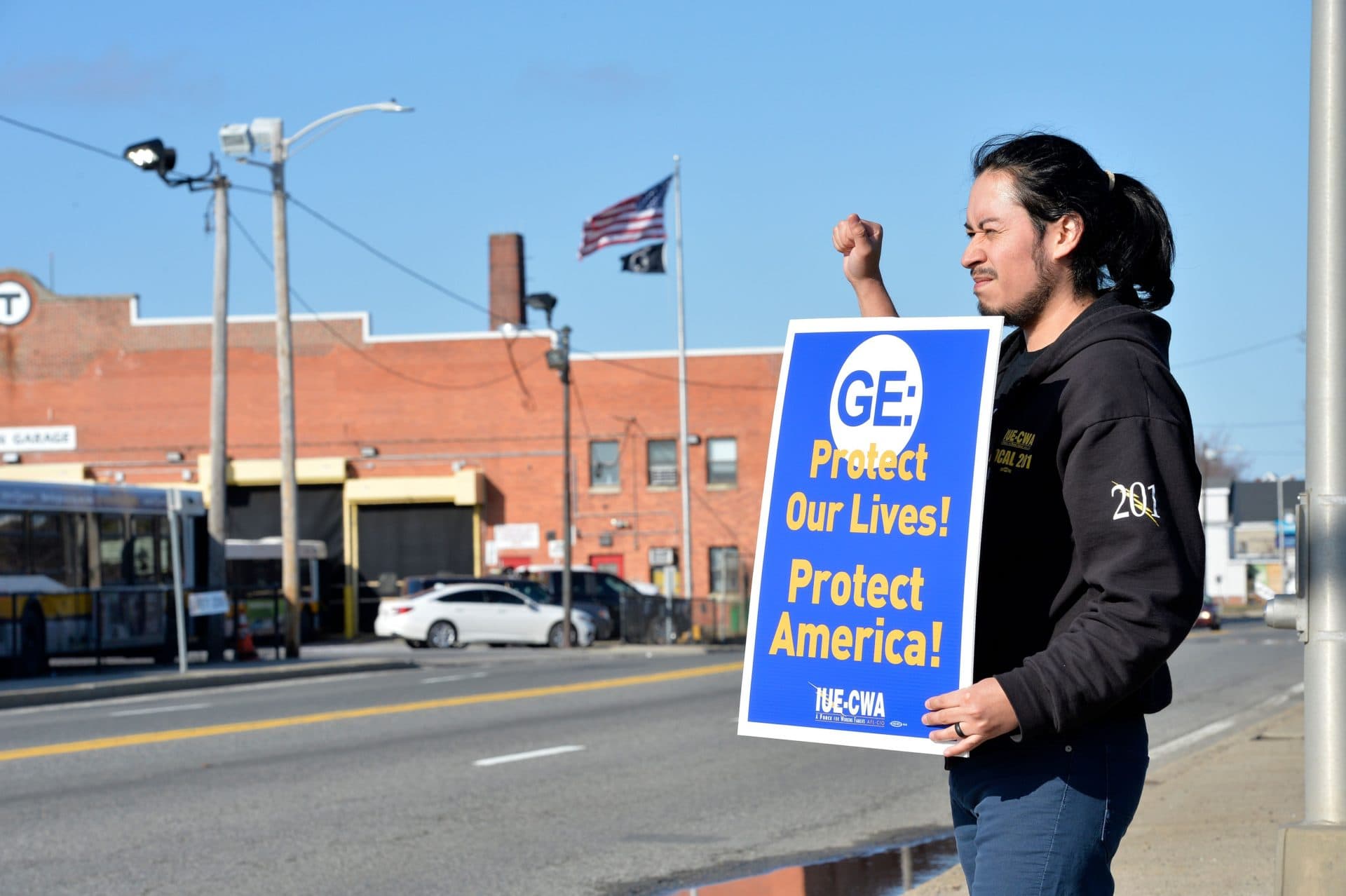 General Electric workers protest at the GE Aviation Plant in Lynn, Massachusetts on March 31, asking for better cleaning and safer working conditions during the COVID-19 pandemic. (Photo by JOSEPH PREZIOSO/AFP via Getty Images)