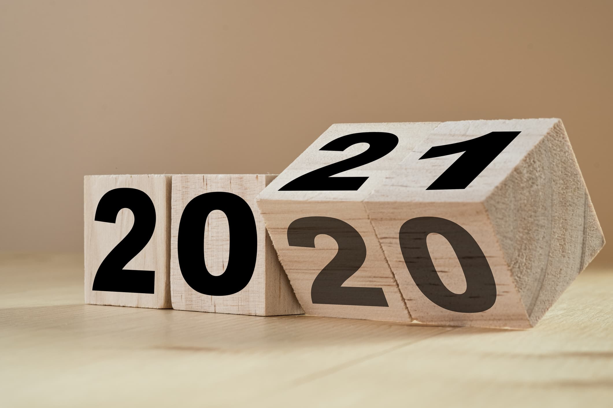 Flipping wooden cubes for the New Year change from 2020 to 2021. (Getty Images)