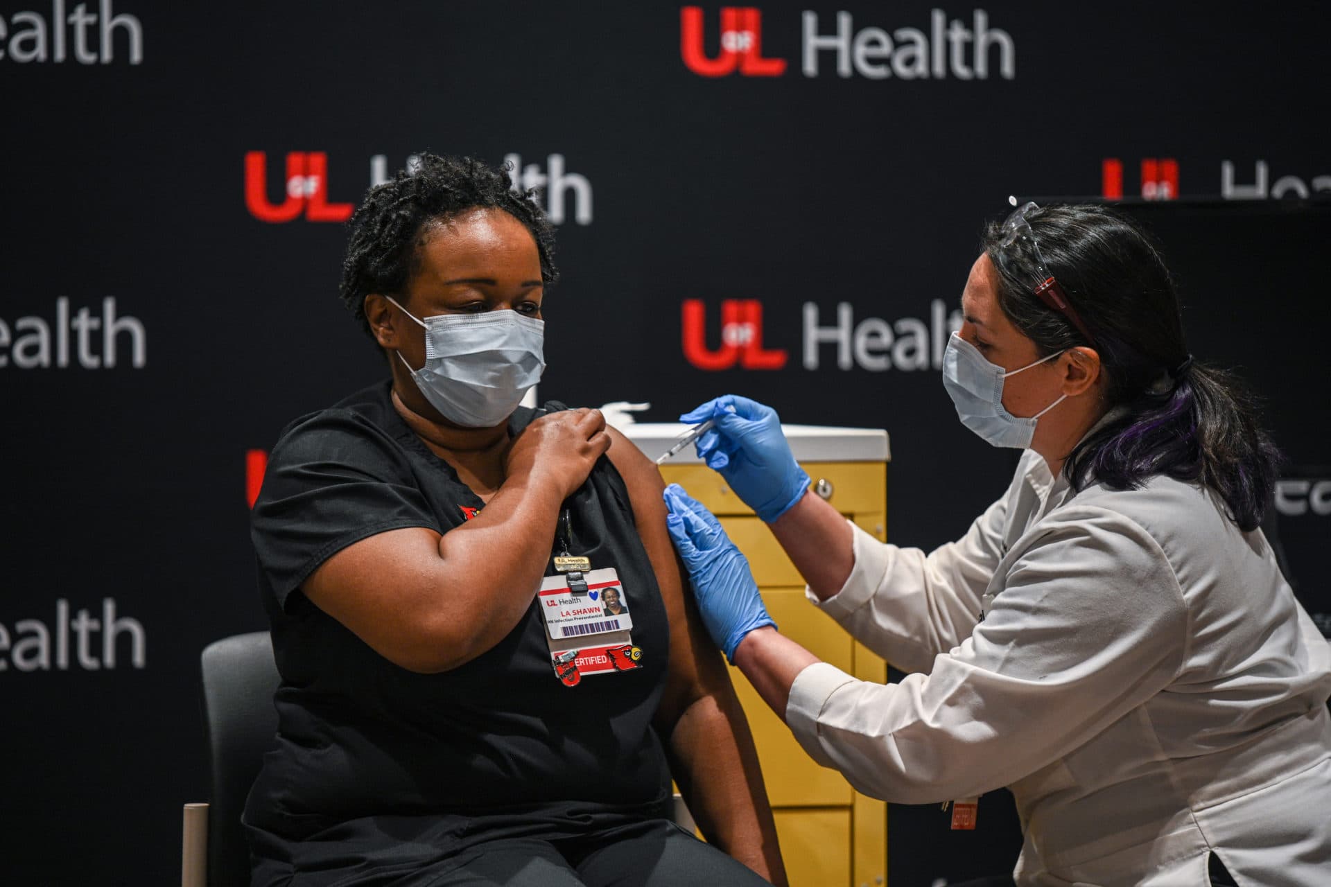 LaShawn Scott, RN receives a COVID-19 vaccination at University of Louisville Hospital on December 14, 2020 in Louisville, Kentucky. The Pfizer-BioNTech vaccine became available for specified use on Monday morning to five members of hospital staff. (Jon Cherry/Getty Images)