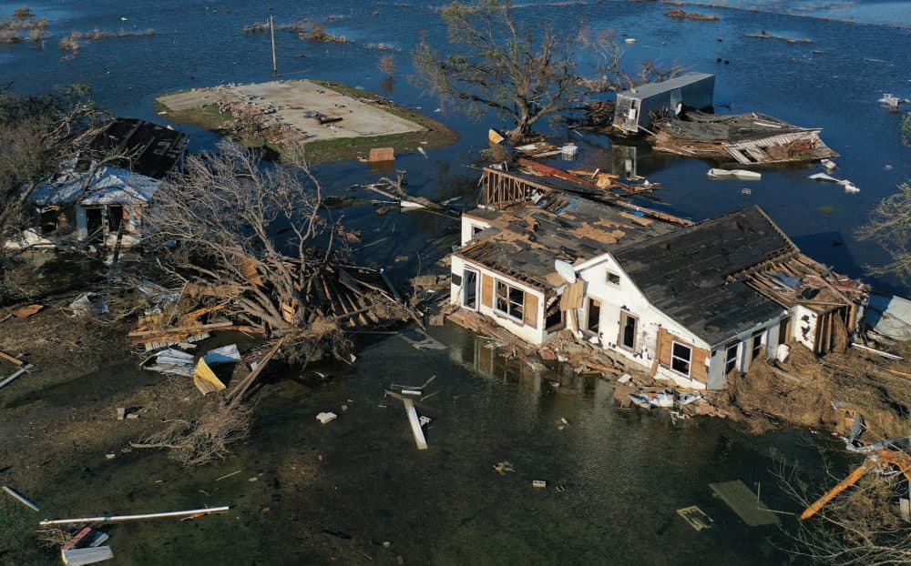 An aerial view of flood waters from Hurricane Delta surrounding structures destroyed by Hurricane Laura on Oct. 10, 2020 in Creole, Louisiana. Hurricane Delta made landfall near Creole as a Category 2 storm in Louisiana initially leaving some 300,000 customers without power. (Mario Tama/Getty Images)
