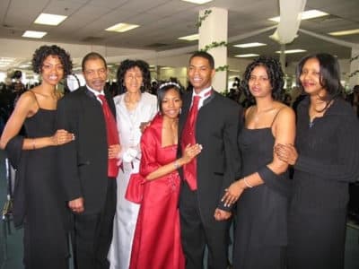 Dr. Chris Parnell's family pictured at her brother, Bishop Pernell's wedding. From left to right, Chris Parnell; her father, Timothy Pernell Sr.; her mother, Merlene G. Pernell; her sister-in-law, Pasha Pernell; Bishop Pernell, her sister Alison D. Pernell; and her oldest sister, Kim Maria Walker, who is considered a COVID-19 long-hauler. (Courtesy)