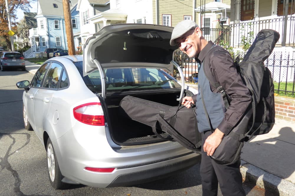Self-employed musician Gian Carlo has been driving around New England to perform serenades throughout the pandemic. (Andrea Shea/WBUR)