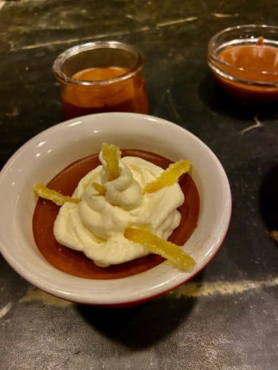 Chocolate mousse with vanilla whipped cream and candied ginger. (Kathy Gunst)