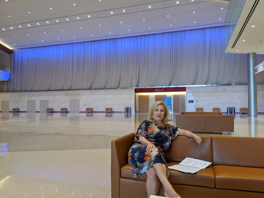 Casandra Matej, president and CEO of Visit San Antonio inside an empty foyer for the Henry B. González Convention Center on Aug. 4, 2020. (Paul Flahive, TPR)
