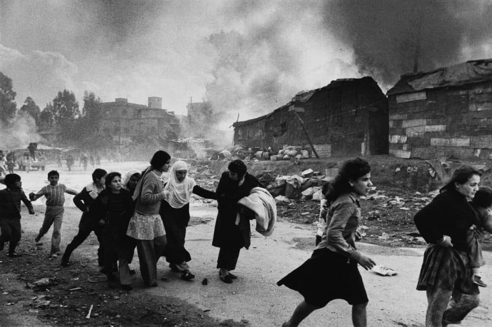 Palestinians flee attack in Beirut, Lebanon in 1976. Up to 1,500 Palestinians died in the Karantina massacre by Christian Falangist gunmen. (Don McCullin)