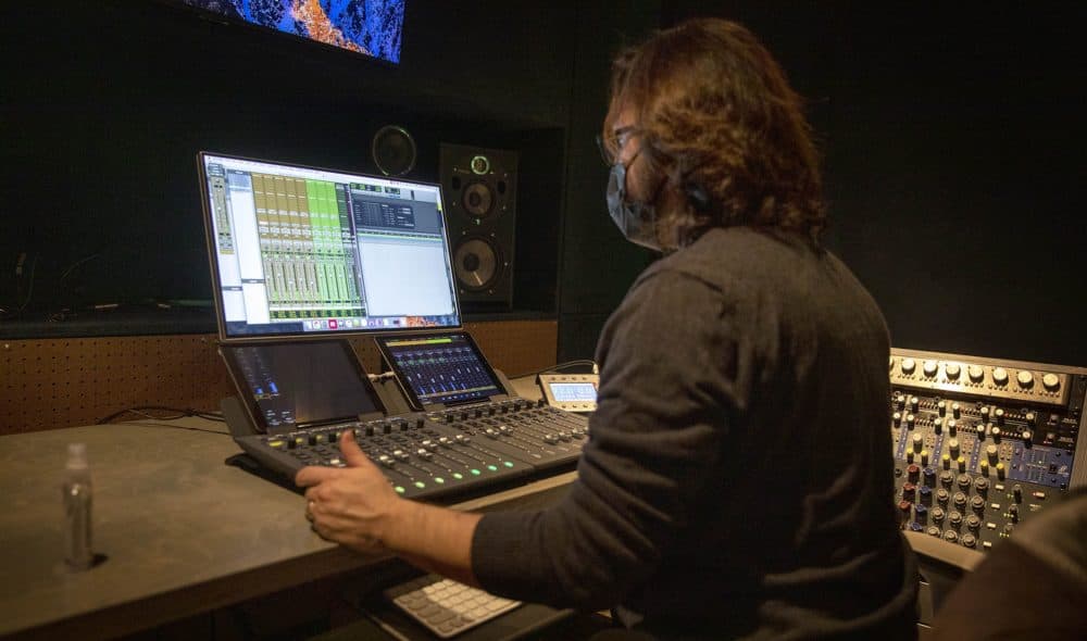 Music producer John Escobar works in the Studio B control room at The Record Co. (Robin Lubbock/WBUR)