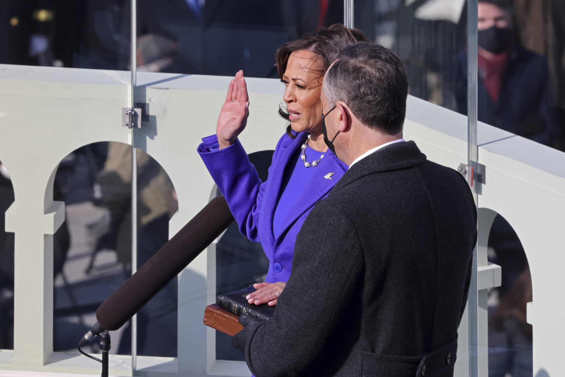 Kamala Harris is sworn as Vice President by U.S. Supreme Court Associate Justice Sonia Sotomayor as her husband Doug Emhoff looks on. (Tasos Katopodis/Pool Photo via AP)