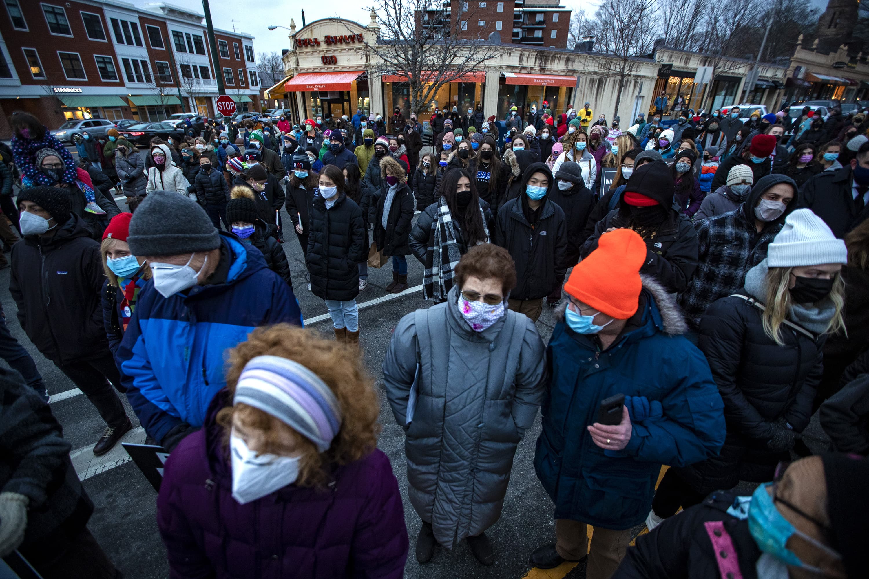 Hundreds gathered in Cushing Square in Belmont for a vigil to honor the memory of Henry Tapia, the day after he had an altercation with a man who called him a racial slur and then drove over him, ultimately killing Tapia. (Jesse Costa/WBUR)