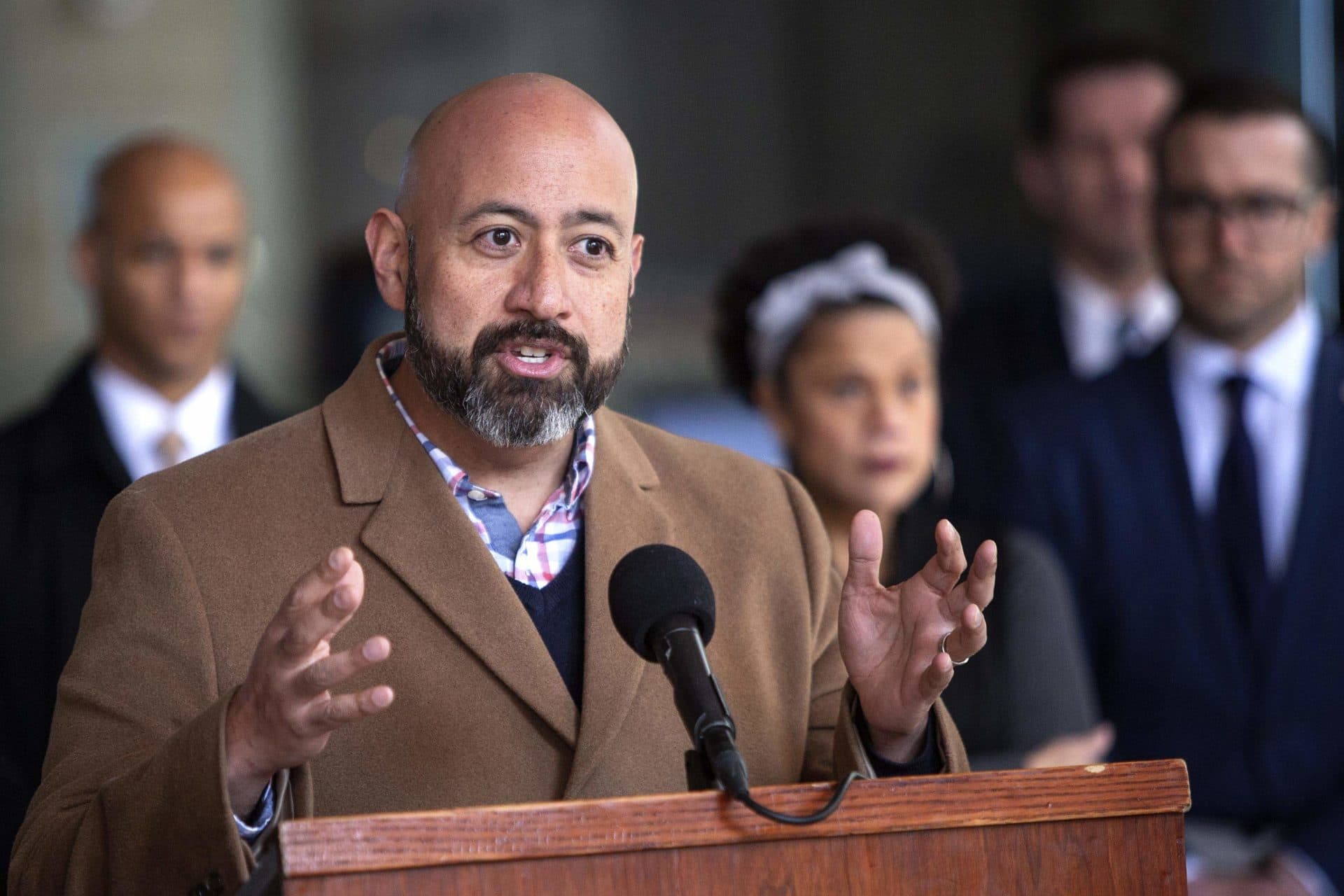 In this file photo, Marty Martinez, chief of the Mayor's Office Health and Human Services for the city of Boston, speaks in front of City Hall on March 16, 2020. (Robin Lubbock/WBUR)