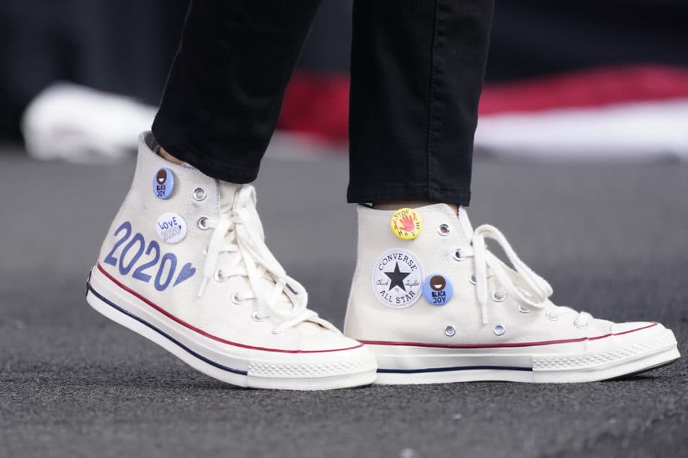 Converse high-top sneakers of Democratic vice presidential candidate Sen. Kamala Harris, D-Calif., are shown as she speaks at a drive-in early voting event, Saturday, Oct. 31, 2020, in Miami, Fla. (Wilfredo Lee/AP)