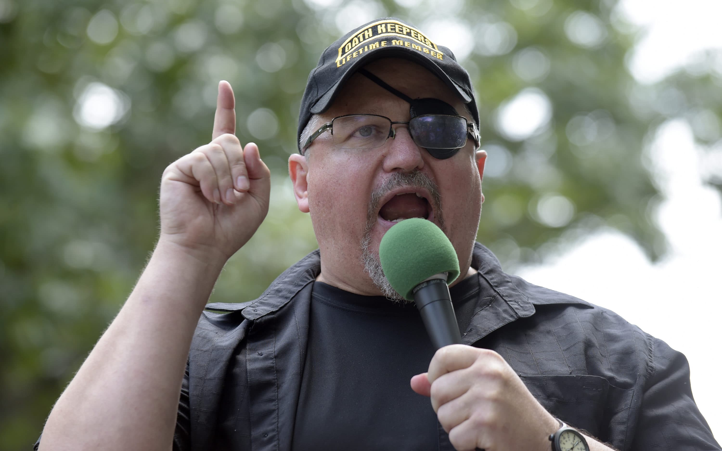 Stewart Rhodes, founder of the citizen militia group known as the Oath Keepers speaks during a rally outside the White House in Washington in 2017. (Susan Walsh/AP)