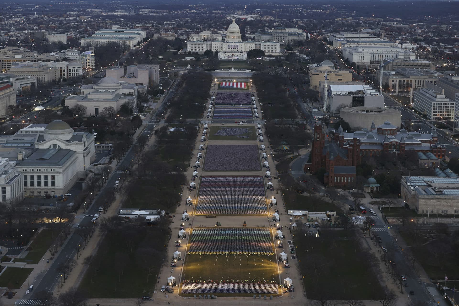 A view of the U.S. Capitol and National Mall on Monday night. (Joe Raedle/Pool via AP)