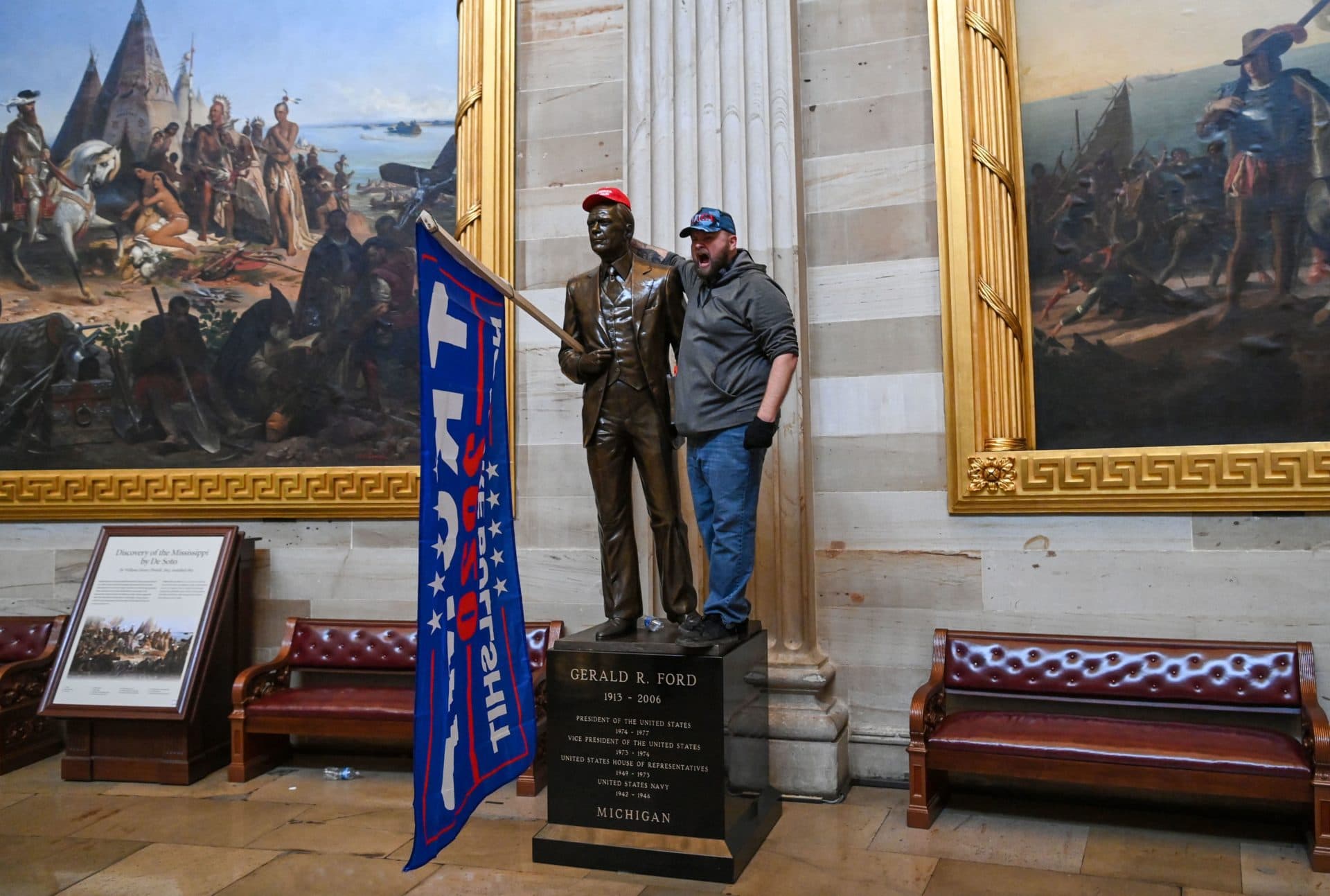 Supporters of U.S. President Donald Trump enter the U.S. Capitol's Rotunda. (Saul Loeb/AFP via Getty Images)