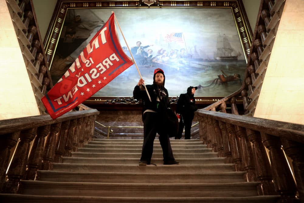 Protesters supporting U.S. President Donald Trump storm the U.S. Capitol on January 06, 2021 in Washington, DC. Congress held a joint session today to ratify President-elect Joe Biden's 306-232 Electoral College win over President Donald Trump. Pro-Trump protesters entered the U.S. Capitol building during demonstrations in the nation's capital. (Photo by Win McNamee/Getty Images)