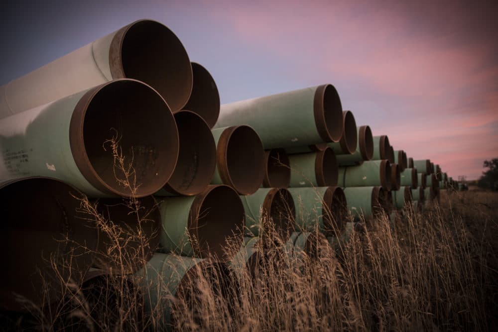 Miles of unused pipe, prepared for the proposed Keystone XL pipeline, sit in a lot on October 14, 2014 outside Gascoyne, North Dakota. (Andrew Burton/Getty Images)