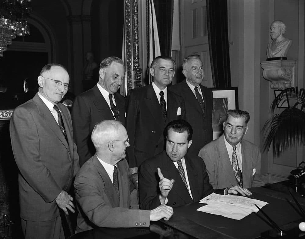 Vice President Richard Nixon is shown with the six-man committee appointed to study censure charges against Senator Joseph McCarthy of Wisconsin. From left (seated): Senator Arthur Watkins (R), of Utah; Mr. Nixon and Senator Edwin Johnson (D), of Colorado. Standing: From left; Senator Francis case(R), of South Dakota; Senator Frank Carlson (R), of Kansas; Senator John Stennis (D), Mississippi, and Senator Sam Ervin, Jr. (D), North Carolina.