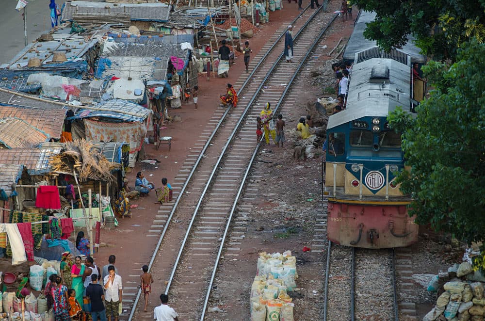 Climate change migrants struggle to survive In Dhaka. Experts expect about 250 million people worldwide to move by 2050. Of those, 20 million to 30 million climate change migrants are expected to be in Bangladesh, likely the largest number from one place. (NurPhoto/Corbis via Getty Images)