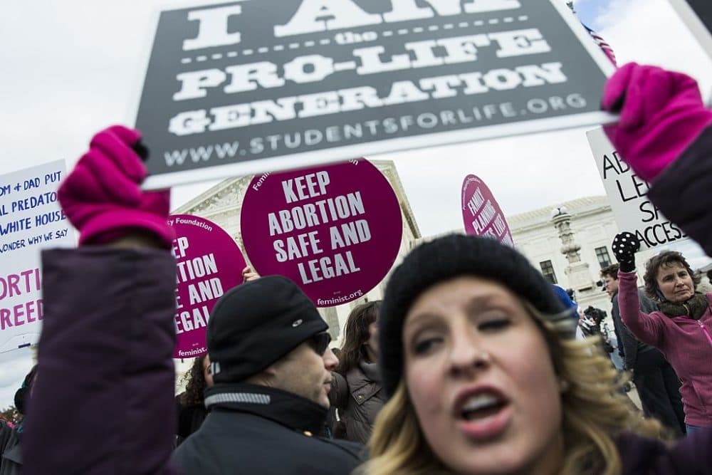 Pro-Life demonstrators try to block Pro-Choice supporters in front of the Supreme Court during the annual March for Life on the anniversary of the historic Roe v. Wade Supreme Court ruling in Washington, USA on January 27, 2017.
(Samuel Corum/Anadolu Agency/Getty Images)