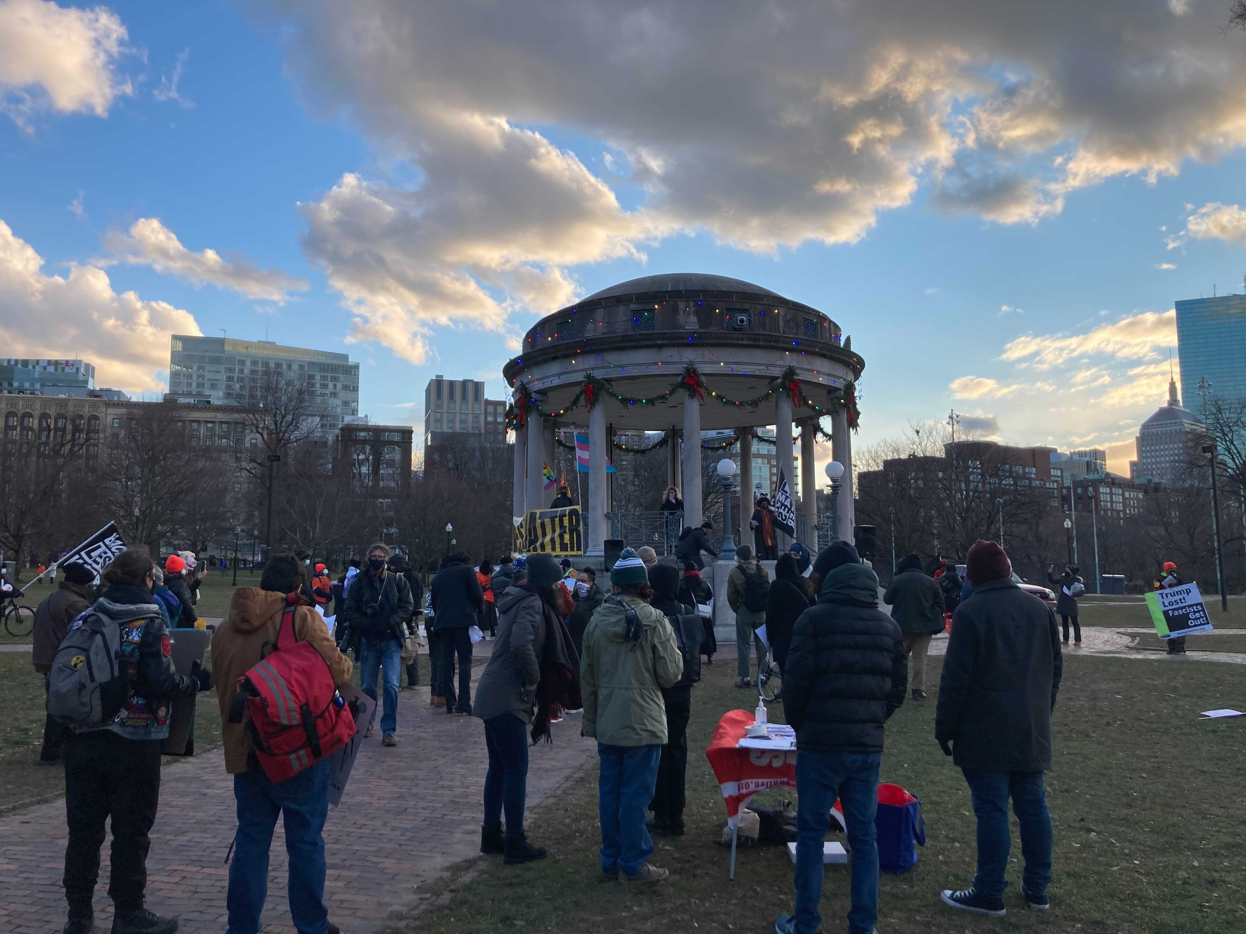 Protesters gathered near the Parkman Bandstand in Boston Common on Inauguration Day. (Shannon Dooling/WBUR)