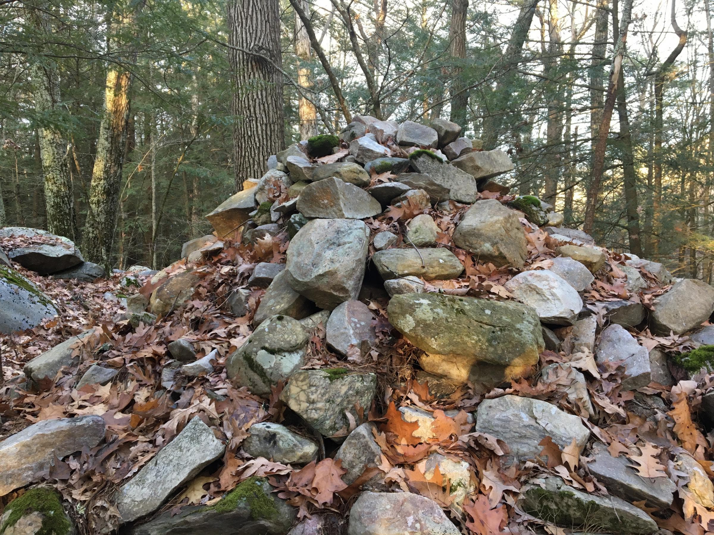 A cairn on Monument Mountain, where the Stockbridge Mohicans left stones in the 1700s. It was looted in 1840 and later reconfigured. (Nancy Eve Cohen/NEPM)
